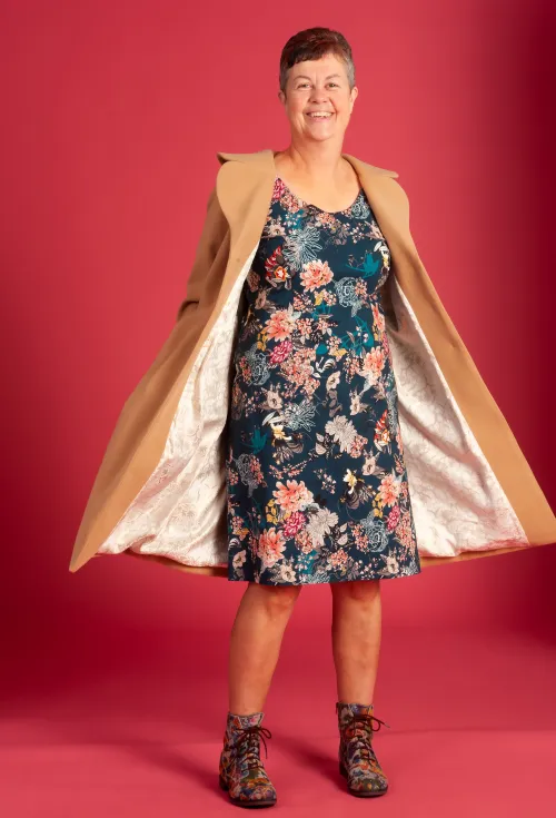 Lee-Ann in our Garden Dress 'Flora' with the Le Akaroa Coat 'Latte' over top for extra warmth